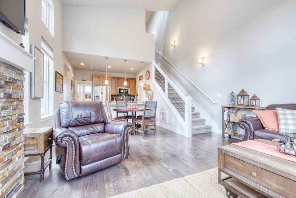 Living area - Located next to the dining area and the stairway to the second floor.