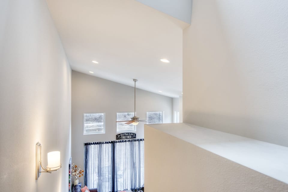 Stairway - Upper portion of the stairway with accentuating the vaulted ceiling of the living area below.