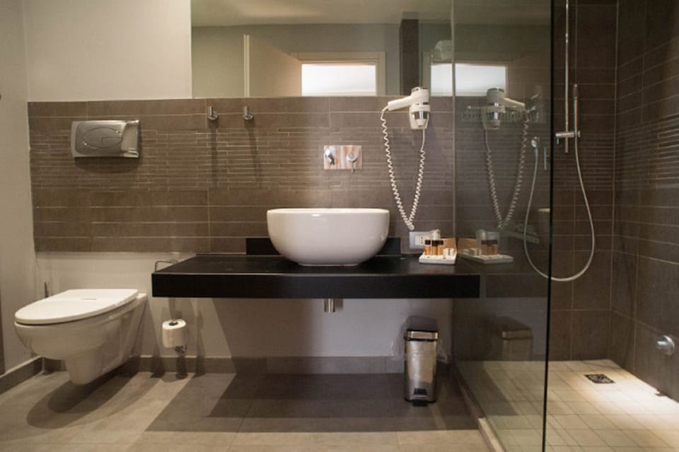 Superior Double Room | Bathroom | Hair dryer, slippers, bidet, towels