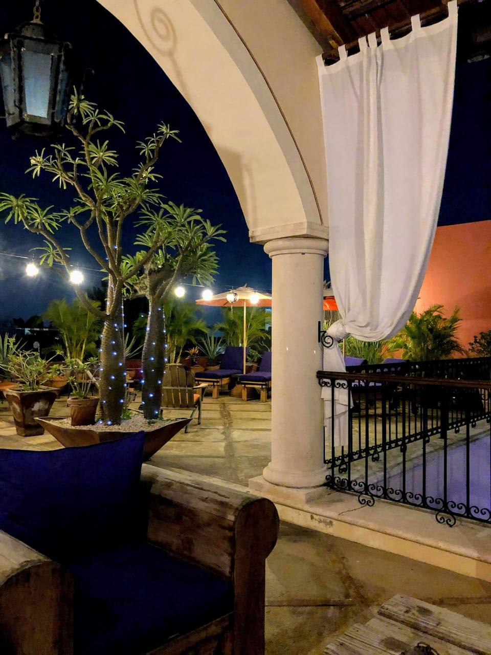 Rooftop patio at night. Perfect place to lounge under the stars & view the city.