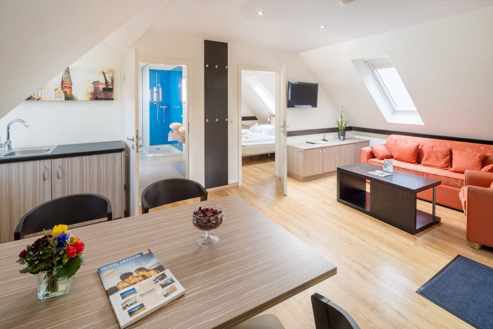 Junior Suite | In-room safe, desk, iron/ironing board, cribs/infant beds