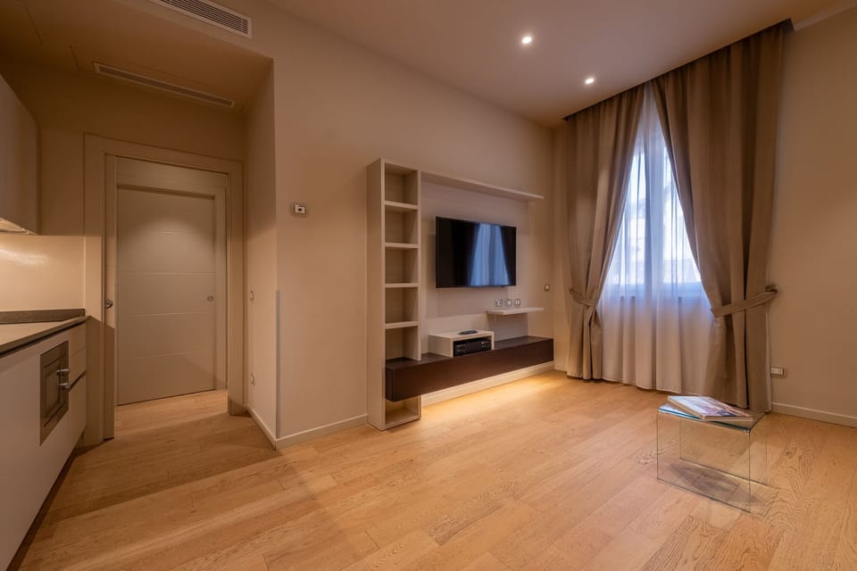 Superior Suite, 1 Bedroom | Living area | Flat-screen TV