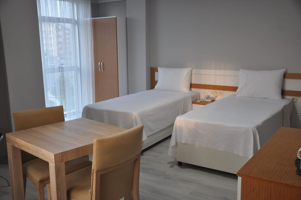 Standard Twin Room, 2 Twin Beds, Balcony | In-room safe, desk, free WiFi