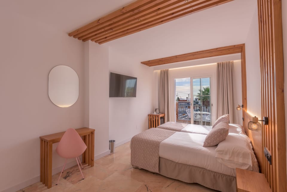 Deluxe Double Room, Terrace, Pool View | Frette Italian sheets, premium bedding, down comforters, minibar