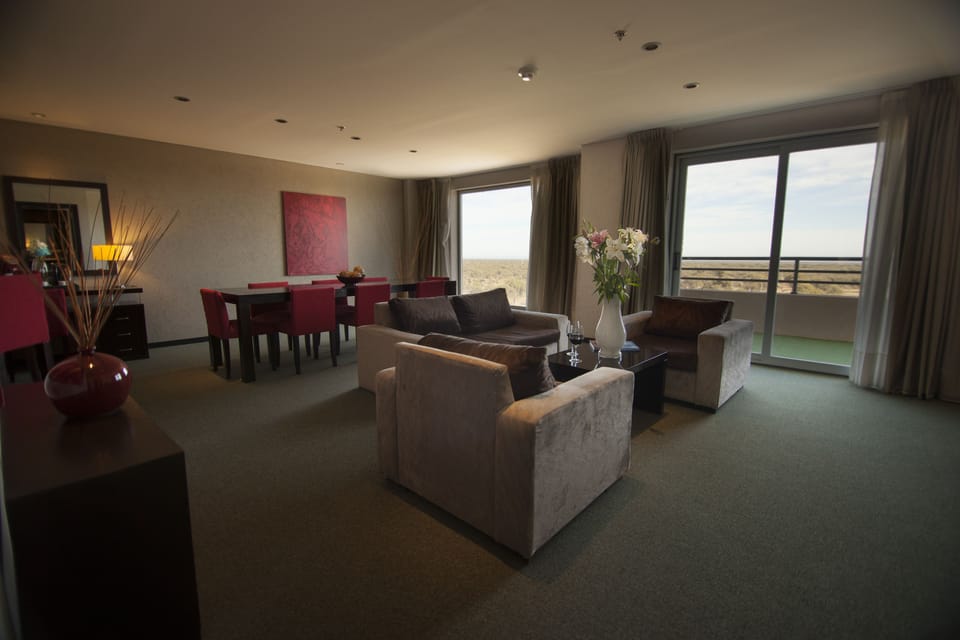Standard Triple Room | Living room | 32-inch flat-screen TV with satellite channels, TV, pay movies