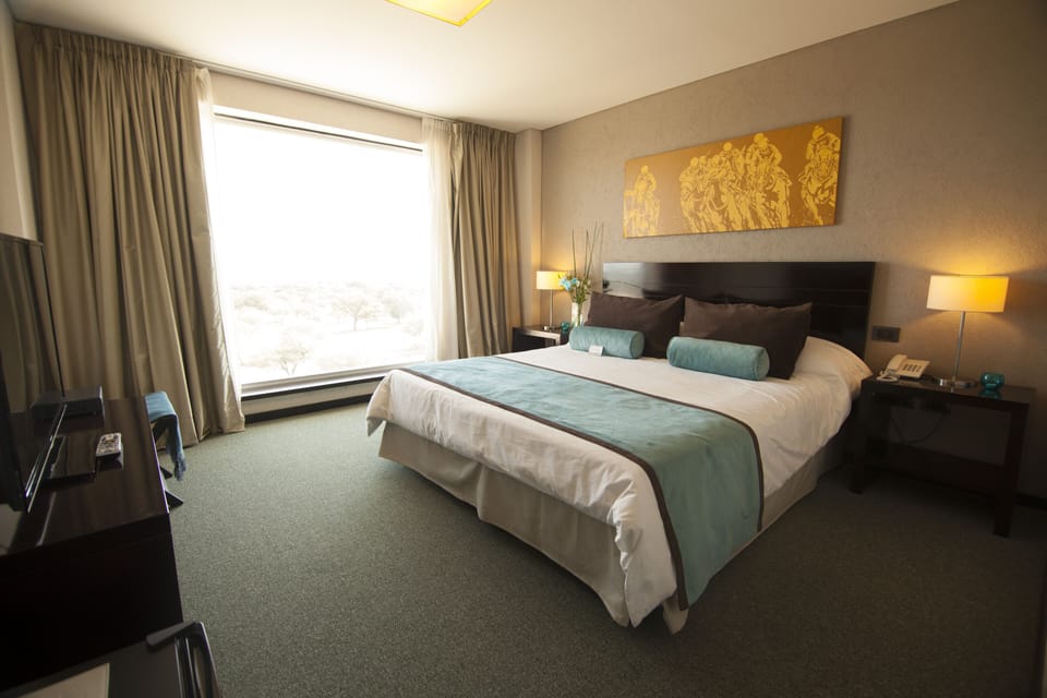 Standard Double Room, 1 King Bed | Minibar, in-room safe, individually decorated, individually furnished