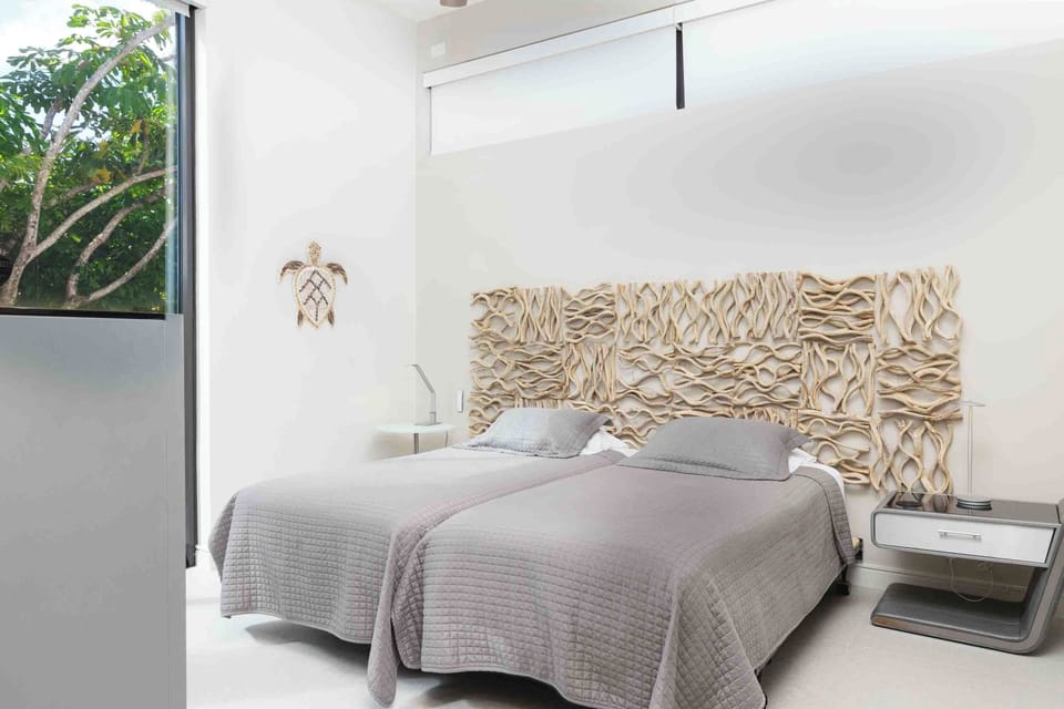 Bedroom 4 with two twin beds. Beds can be fitted into a king bed upon request. 