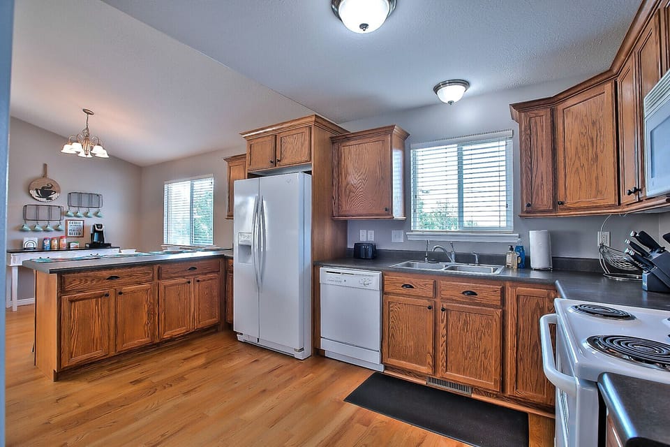 Prepare a snack for a feast in this large, inviting kitchen