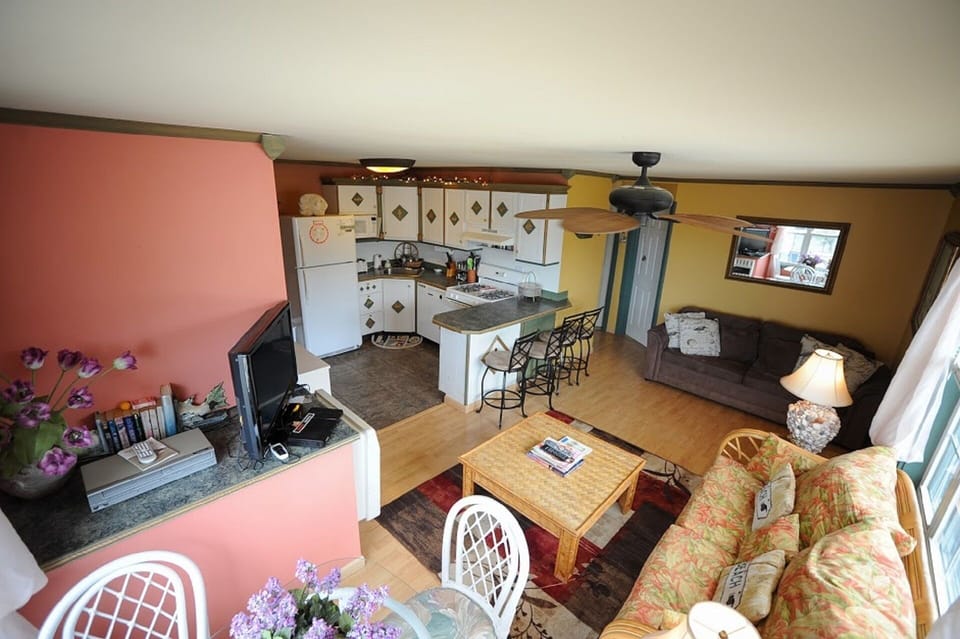 Living room with view of kitchen