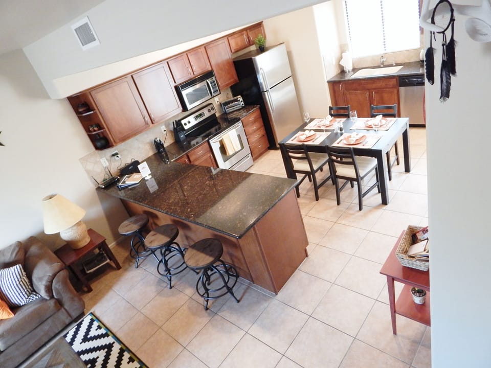 Spacious kitchen with dinning table