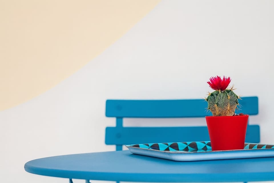 Charming design detail with bright pops of color and minimalist decor—cheerful, modern touch that adds personality to the space.
