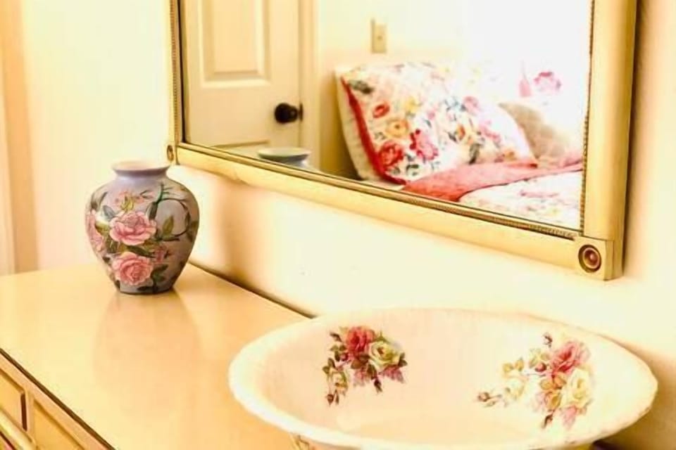 Sweet details make this sunny downstairs room a perfect place to relax and rest