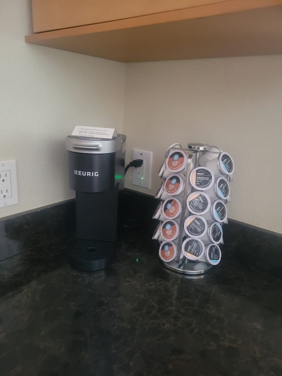 A Keurig coffee maker and K-cups are provided.