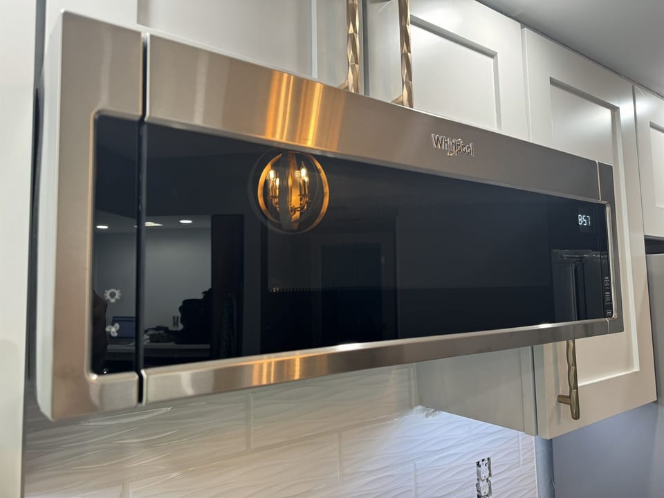 Brand new Whirlpool microwave in Stainless Steal.