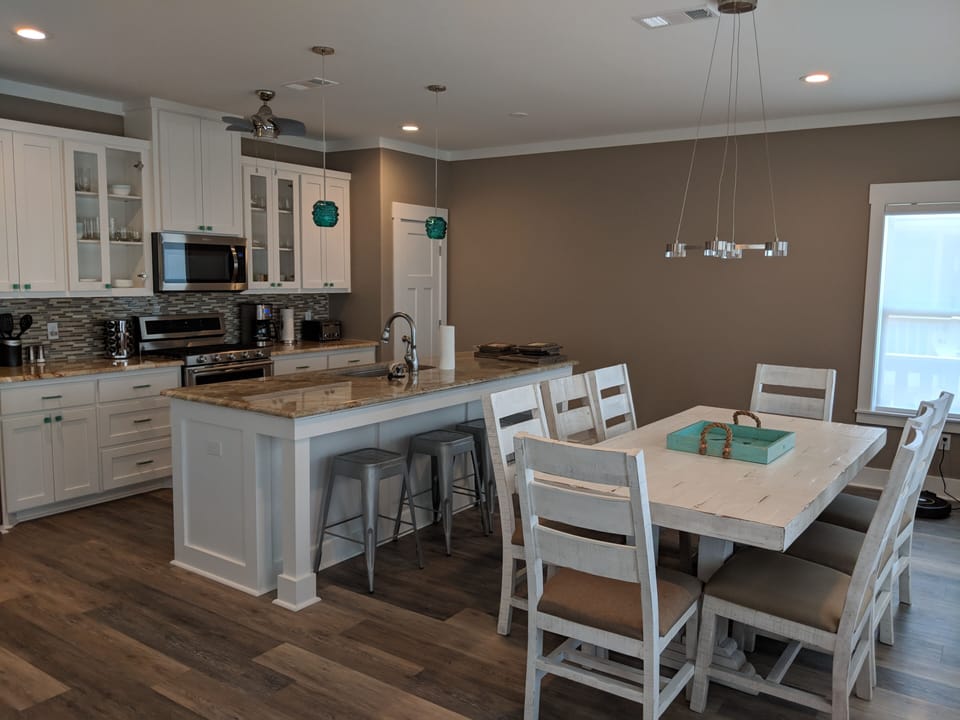 Dining Area, Island with additional seating,  and Kitchen