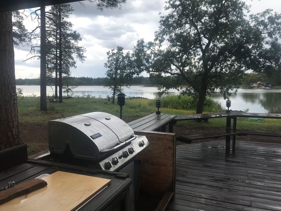 Grill on large deck
seating and lights