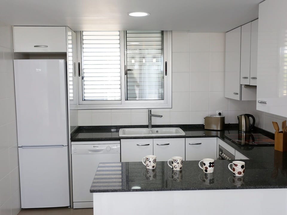 Room, Property, Kitchen, Countertop, Cabinetry, Furniture, Interior Design, Building, Kitchen Stove, Major Appliance