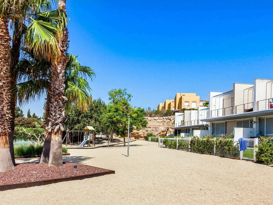 Property, Neighbourhood, Road Surface, Residential Area, Town, Real Estate, Woody Plant, Urban Design, Azure, Arecales