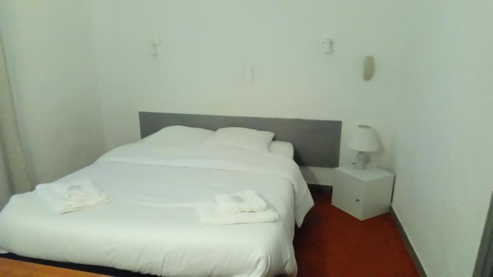 Blackout drapes, soundproofing, iron/ironing board