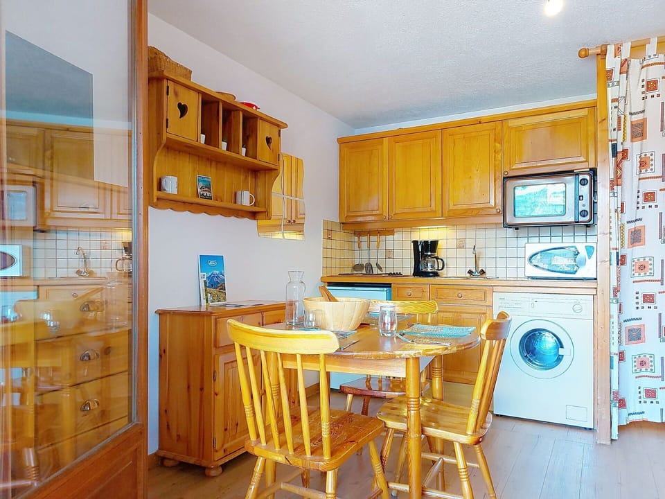Wood, Interior Design, Furniture, Flooring, Floor, Room, Kitchen, Cabinetry, Ceiling, Wood Stain