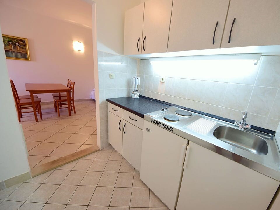 Kitchen Sink, Cabinetry, Tap, Countertop, Sink, Plumbing Fixture, Building, Kitchen, Interior Design, Wood