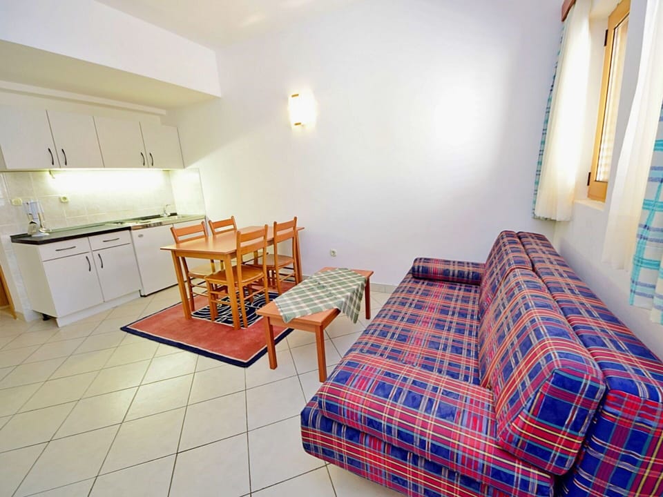 Furniture, Lighting, Countertop, Interior Design, Cabinetry, Flooring, Comfort, Floor, Wood, Chair