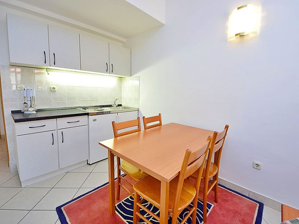 Furniture, Cabinetry, Property, Countertop, Table, Chair, Wood, Sink, Interior Design, Drawer