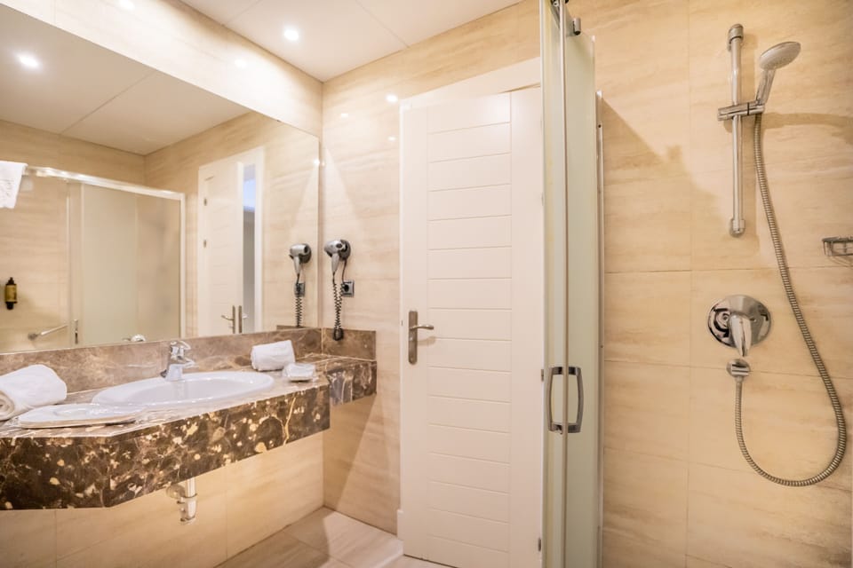 Free toiletries, hair dryer, bidet, towels