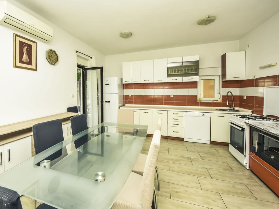 Furniture, Cabinetry, Property, Chair, Interior Design, Table, Houseplant, Desk, Flooring