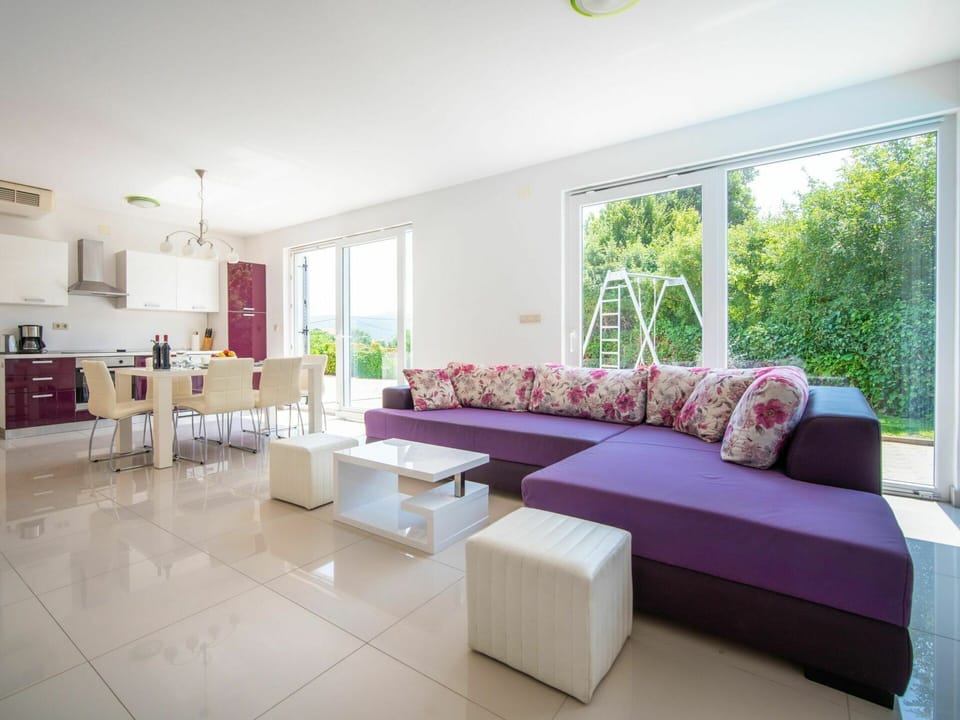 Couch, Furniture, Property, Window, Comfort, Decoration, Purple, Interior Design, Lighting, Wood