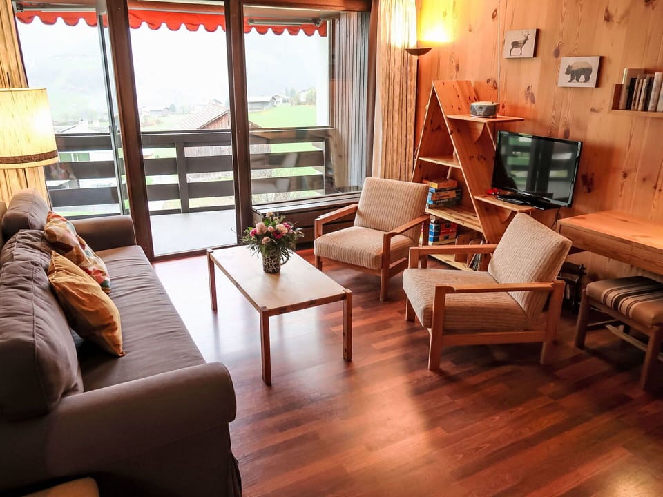 Brown, Furniture, Property, Couch, Picture Frame, Comfort, Table, Wood, Building, Lighting