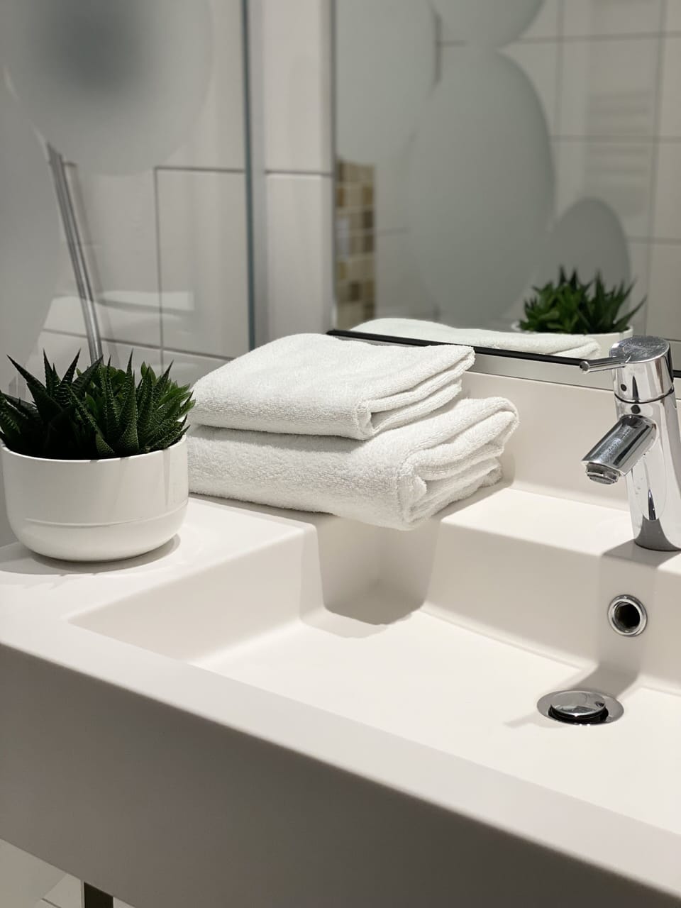 Eco-friendly toiletries, hair dryer, towels