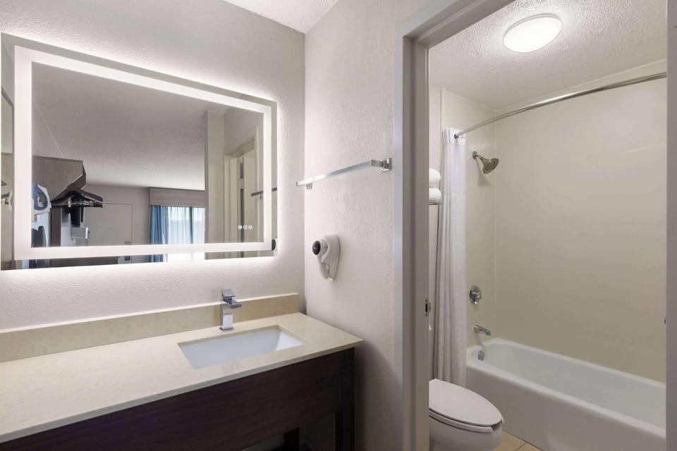 Combined shower/tub, eco-friendly toiletries, hair dryer, towels