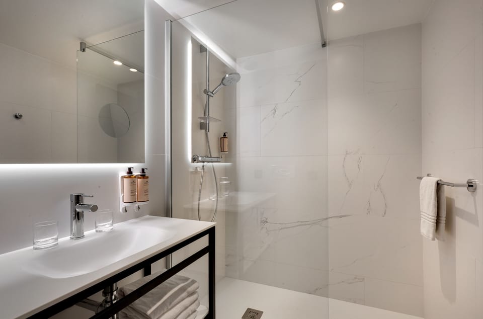 Eco-friendly toiletries, hair dryer, towels
