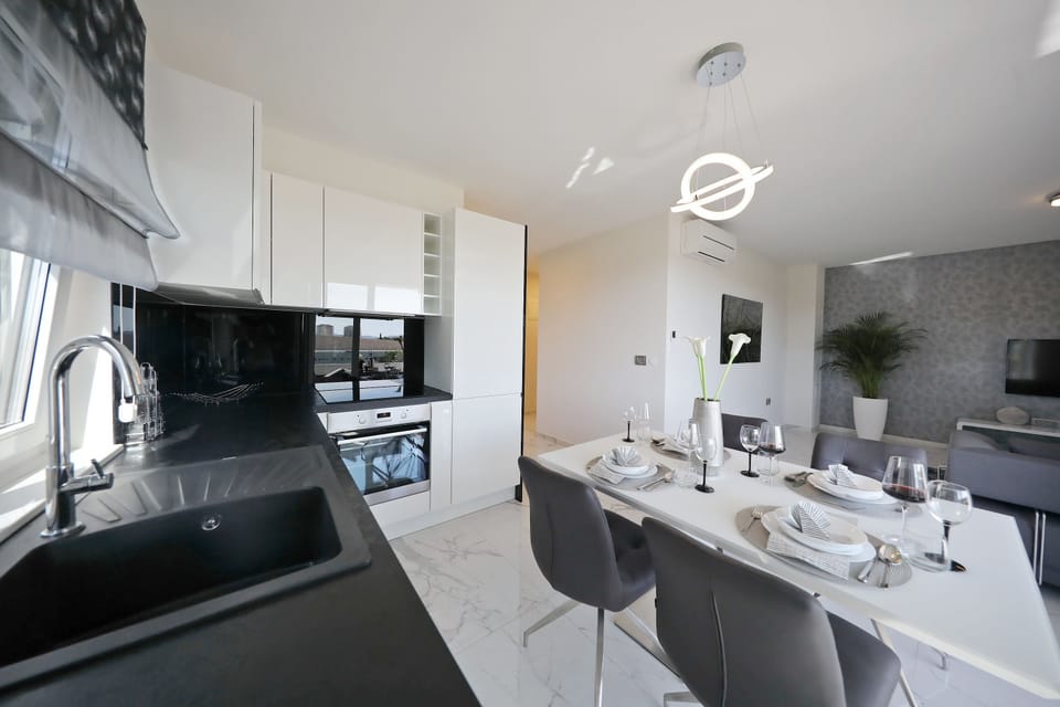 Design Two Bedroom Apartment with City View | Private kitchen | Fridge, microwave, oven, stovetop