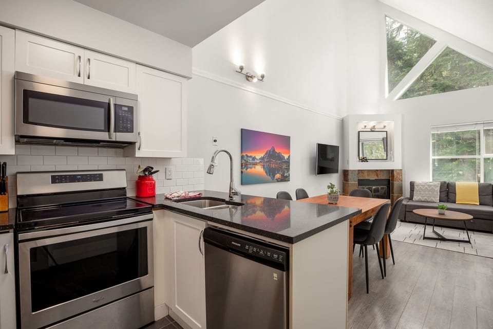 The fully equipped kitchen includes modern appliances and all your cooking essentials.