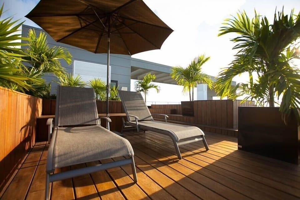 sun loungers on roof top deck