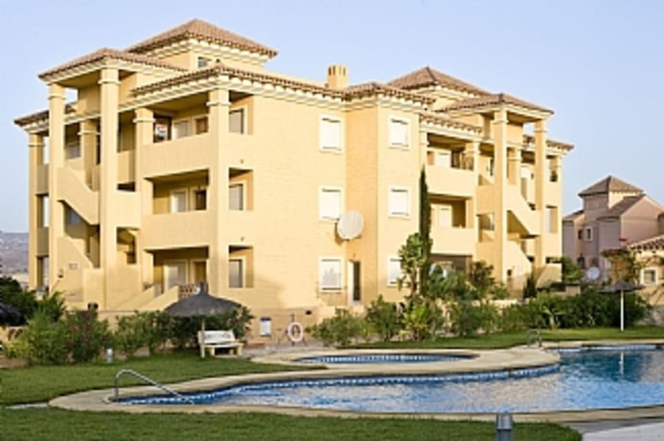 Shared pool and sunbathing area