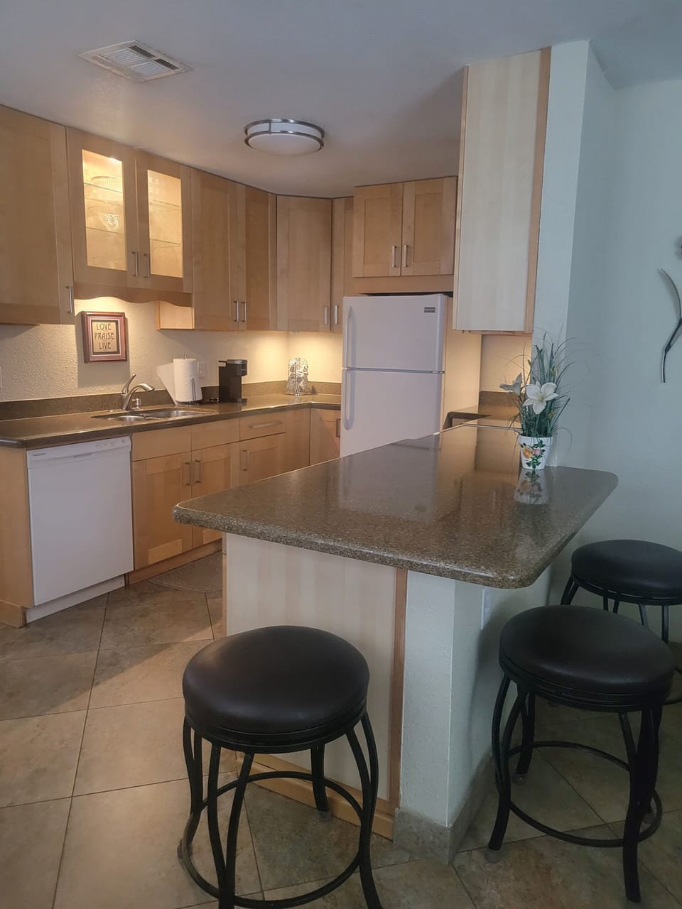 Kitchen with lots of cabinets.
