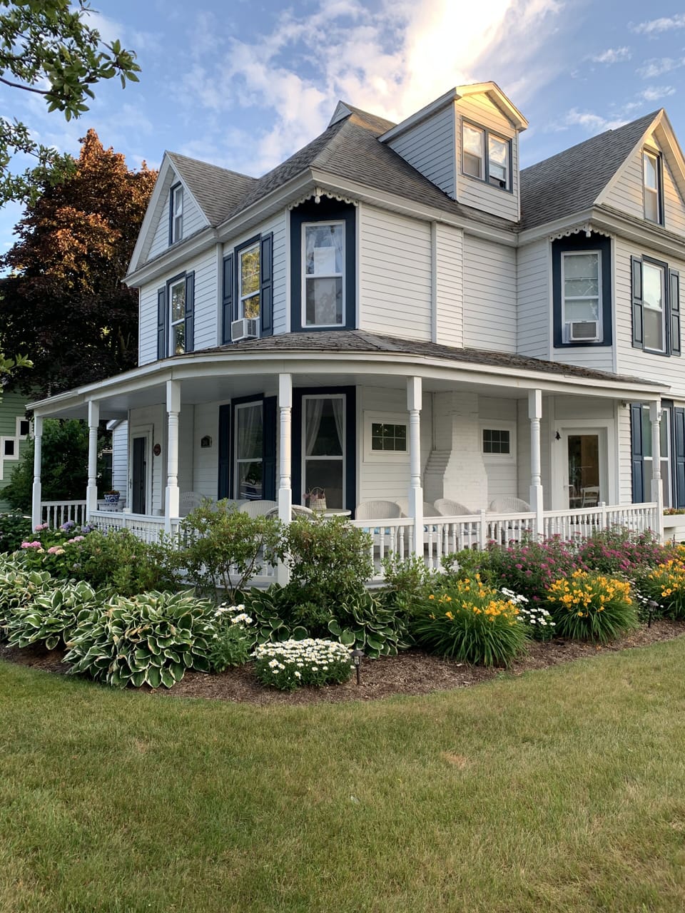 Gorgeous updated Victorian home with wrap around porch