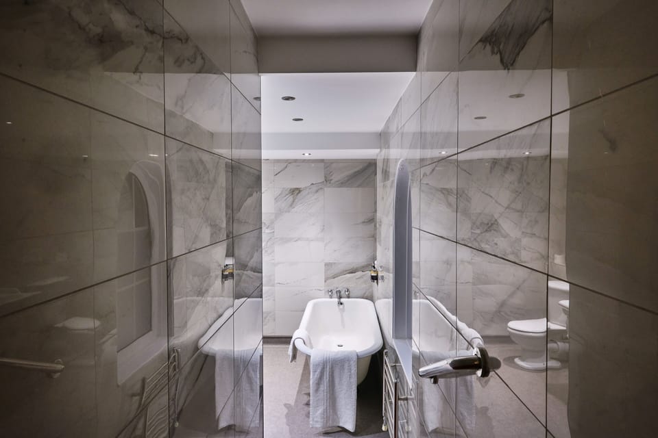 Shower, free toiletries, hair dryer, bathrobes