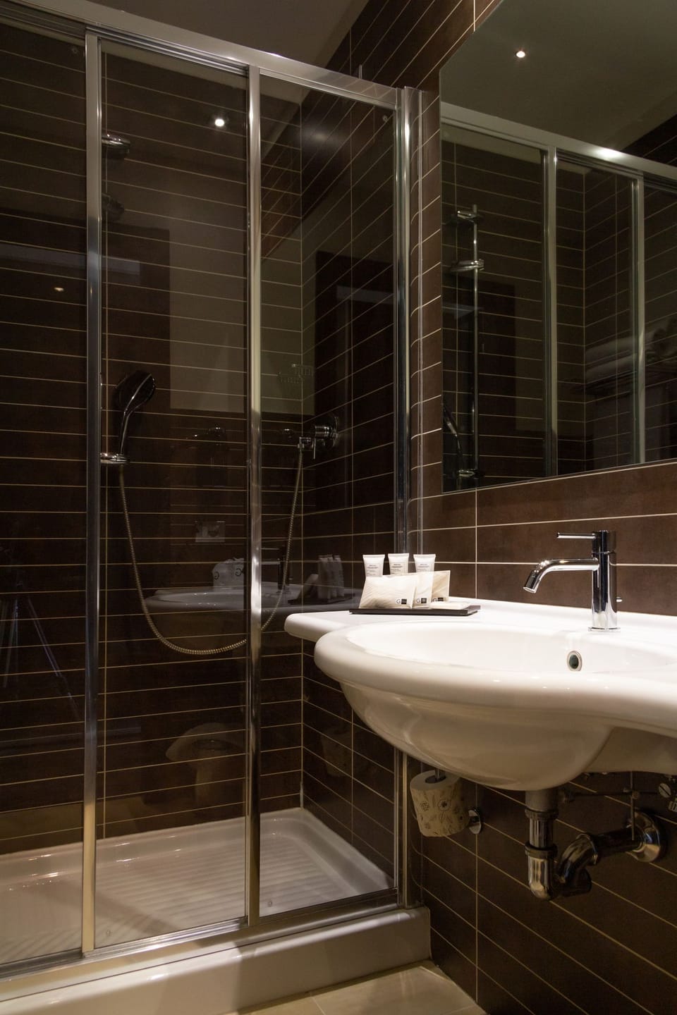 Shower, free toiletries, hair dryer, slippers