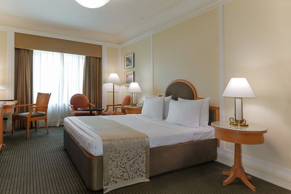 Deluxe Room | In-room safe, individually decorated, individually furnished, desk