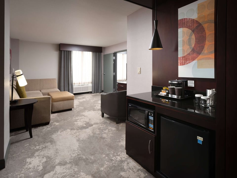 Suite, 1 King Bed, Non Smoking | Down comforters, in-room safe, desk, blackout drapes