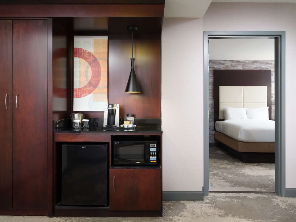 Suite, Non Smoking | Down comforters, in-room safe, desk, blackout drapes