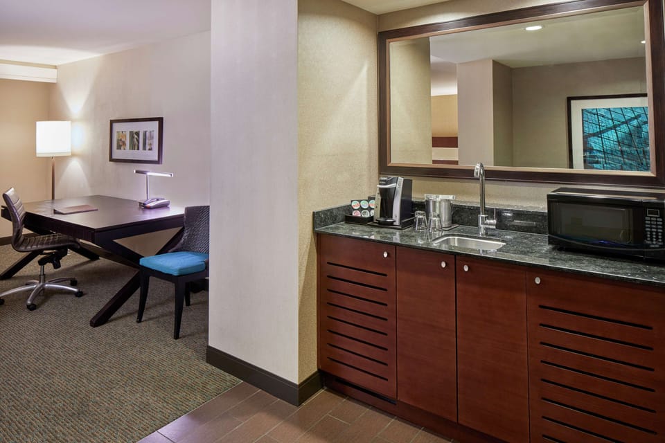 Premium bedding, down comforters, pillowtop beds, in-room safe