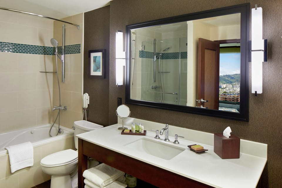 Designer toiletries, hair dryer, towels, soap