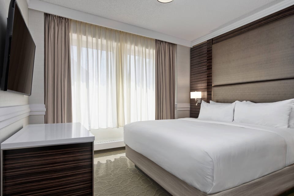 Premium bedding, pillowtop beds, desk, blackout drapes