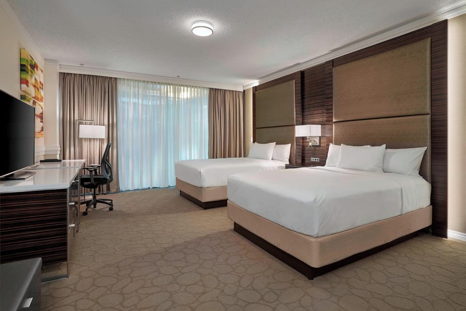 Premium bedding, pillowtop beds, desk, blackout drapes
