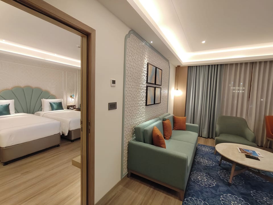 SeleQtions 2 Bedroom Suite | Living area | TV